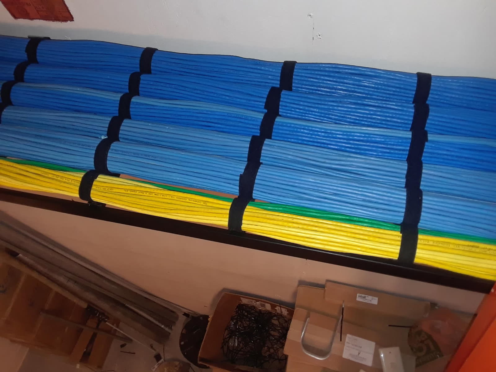 Structured cabling equipment rack with patch panels installed by Brightwire Electric in a hotel