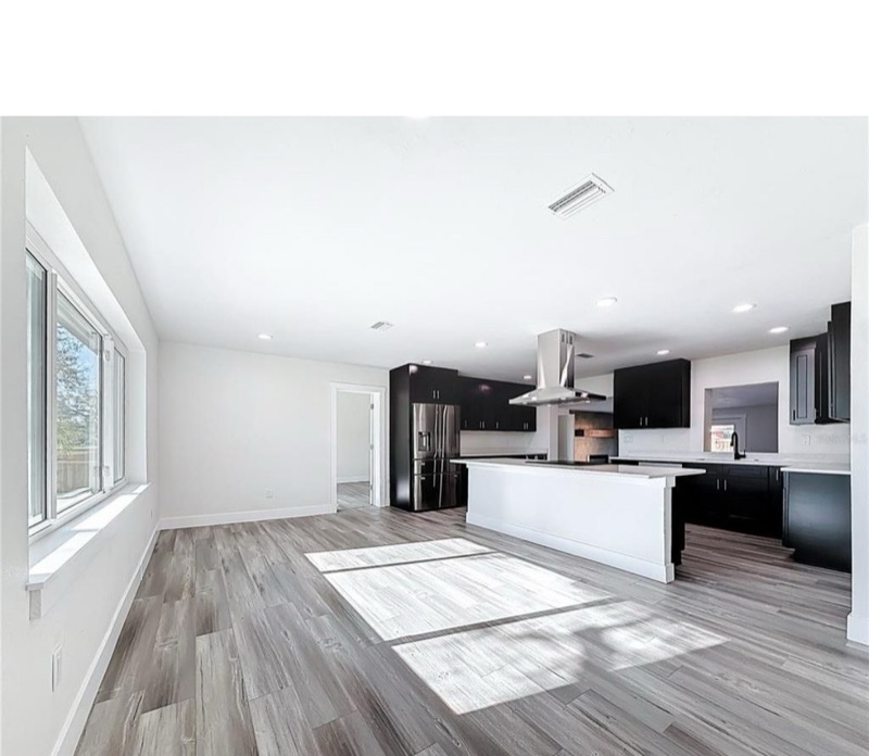 Modern kitchen with recessed LED lighting installed by Brightwire Electric in Largo FL
