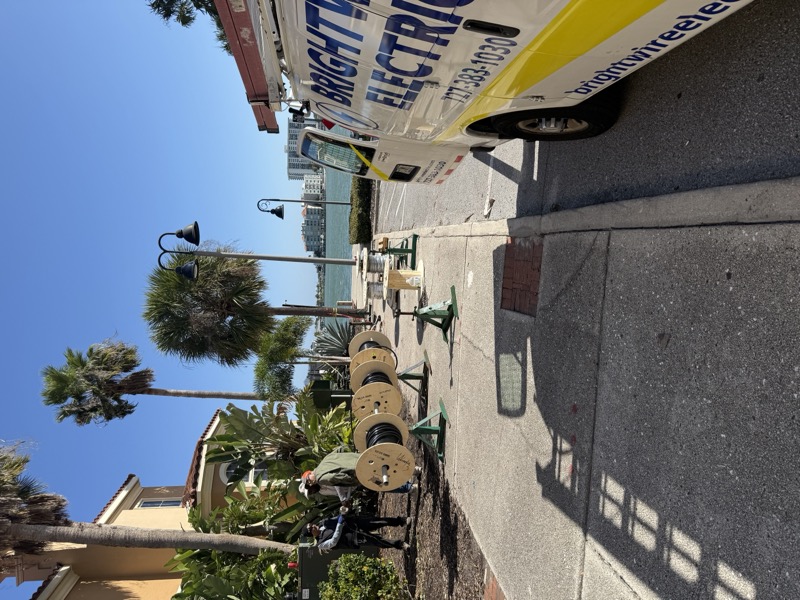 Brightwire Electric service truck with equipment at a Tampa Bay job site